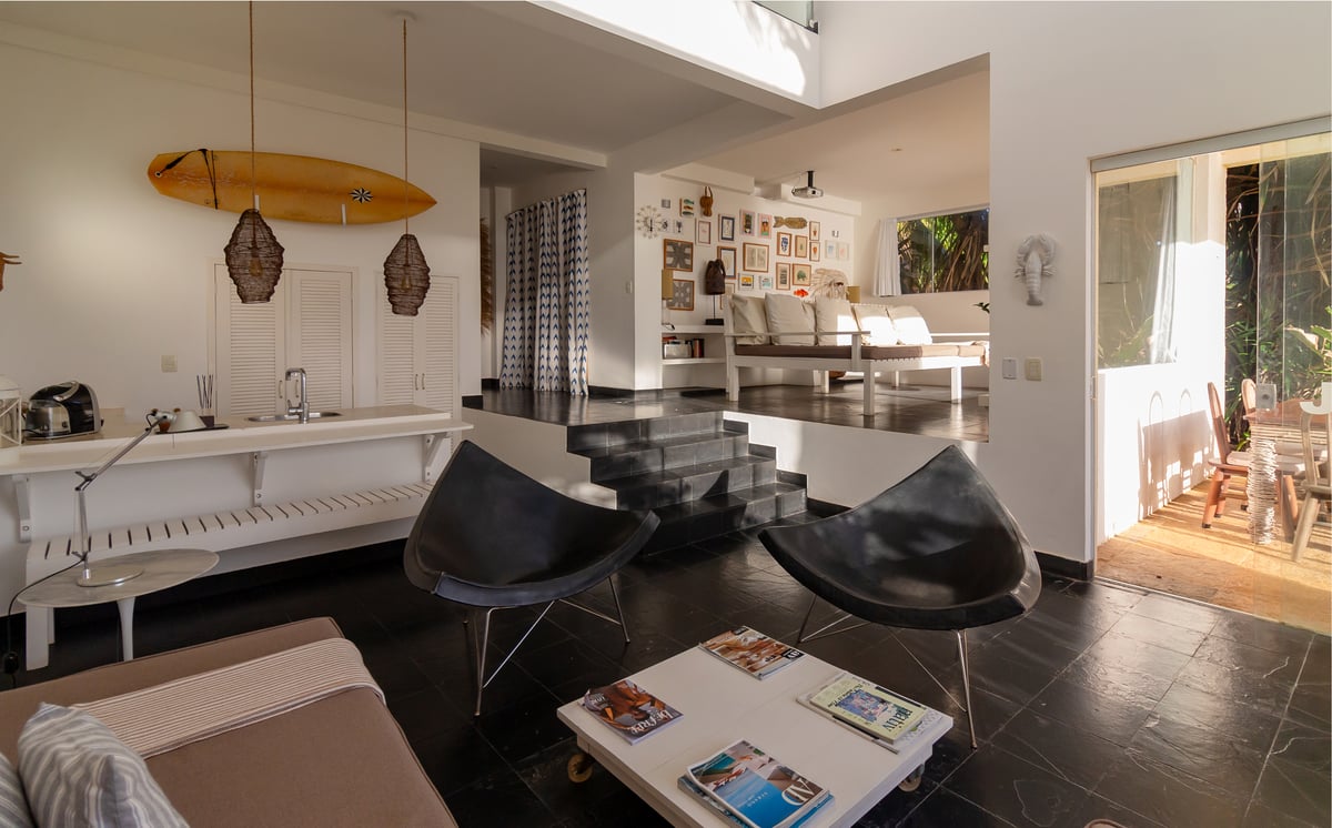 Rationalist style with views of the Atlantic Ocean and plateau, evoking memories of Mediterranean sea voyages.